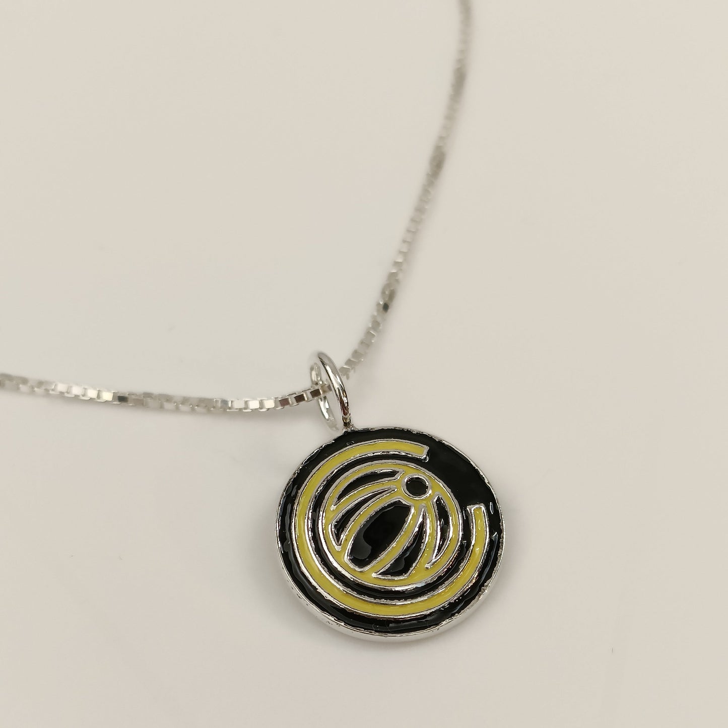 Embla "Glimt" anheng med kjede