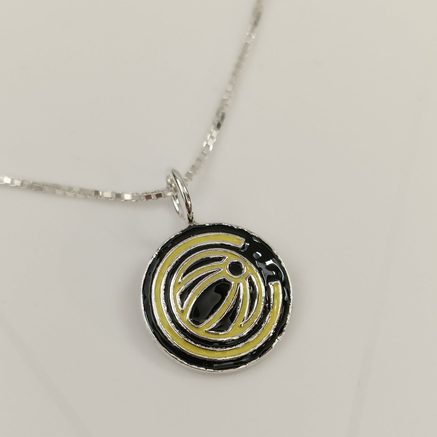 Embla "Glimt" anheng med kjede